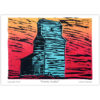 grain elevator on the prairies with gold and red sunset in the background