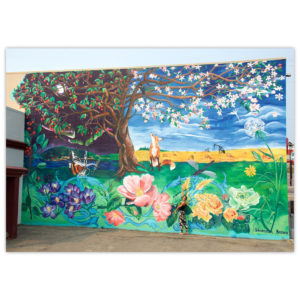 Artist Shannon Brown and her mural depicting the natural of beauty of Peace River