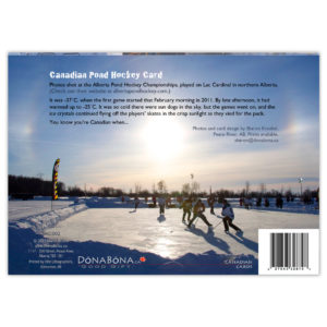 Alberta Pond Hockey Championships game with sundogs in the sky