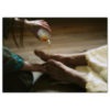 woman pouring perfume on Jesus' feet