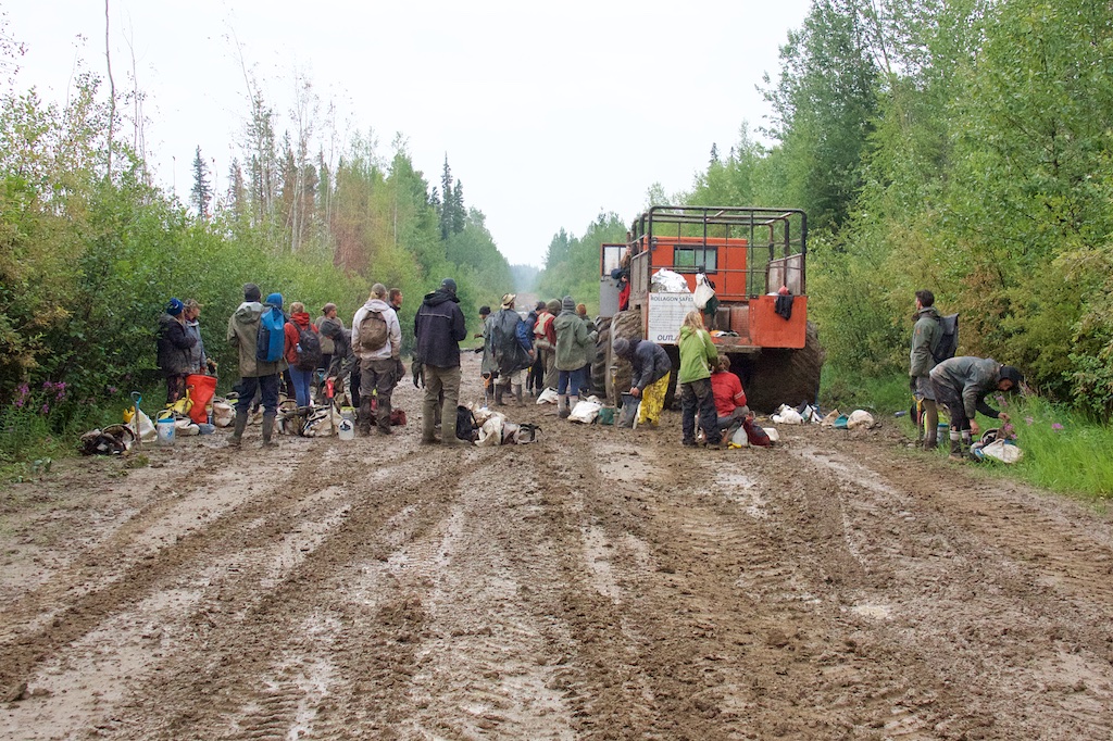 Tree planters on a forestry road beside the Rollagon